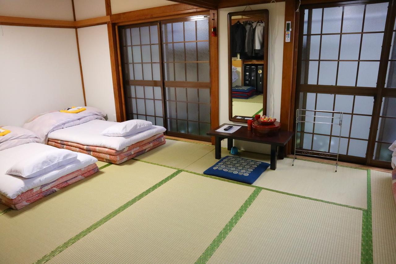 Japanese-Style Family Room with Shared Bathroom